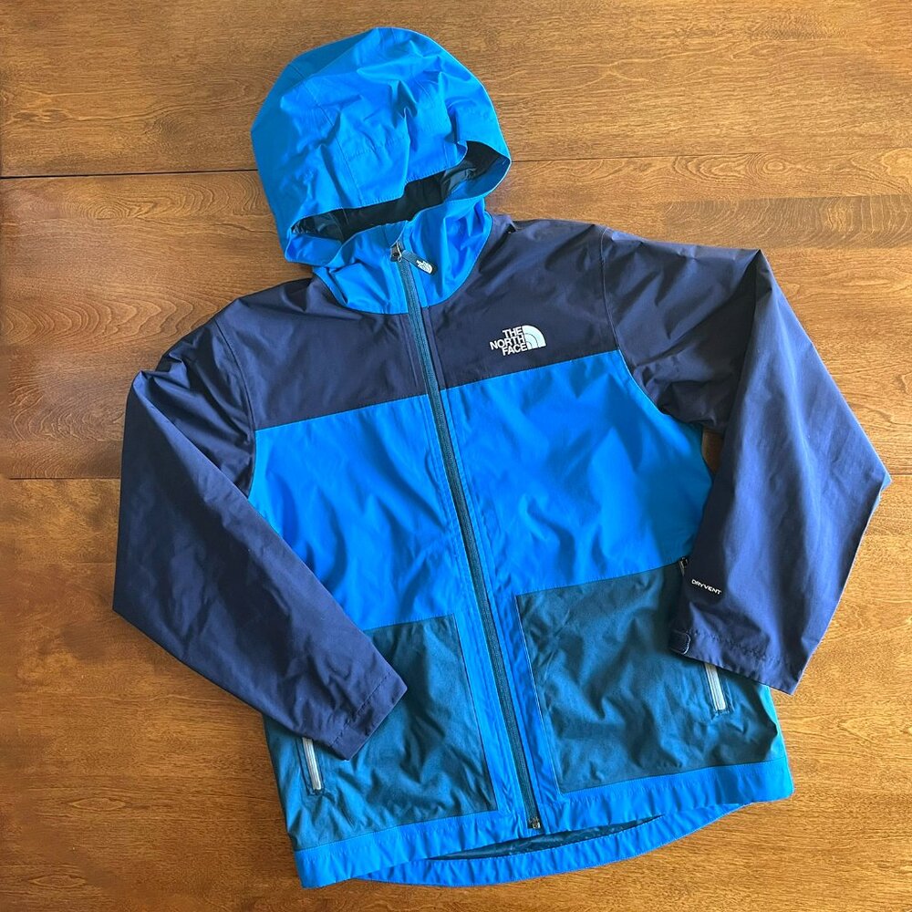 The North Face blue shell jacket L 14/16